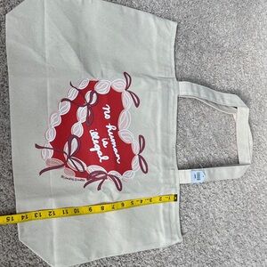 “No Human is Illegal” Canvas Tote Bag with Red Graphic Size 15x20